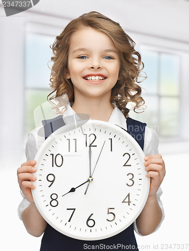 Image of girl with big clock