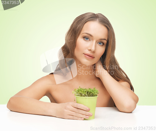 Image of woman with green grass