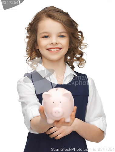 Image of girl with piggy bank