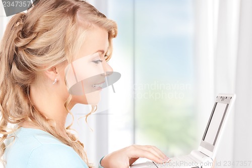 Image of businesswoman with laptop