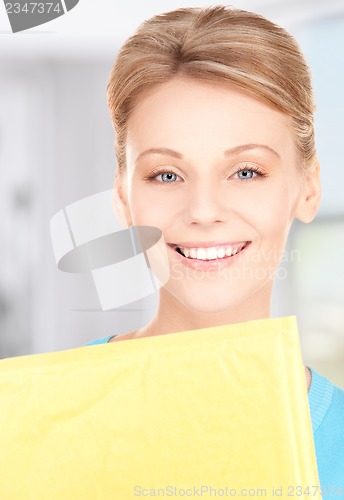 Image of businesswoman with parcel