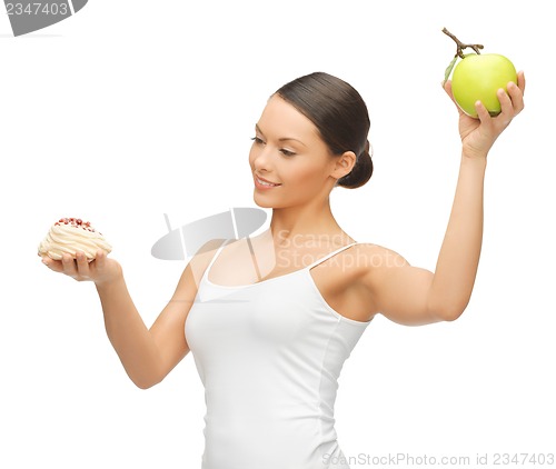 Image of woman with cake and apple