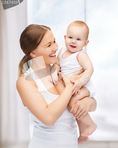 Image of happy mother with adorable baby