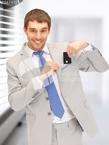 Image of businessman with credit card