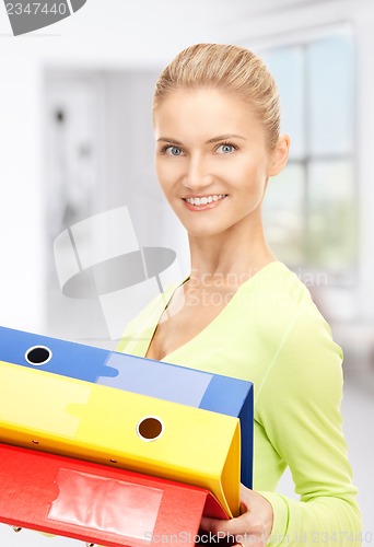 Image of businesswoman with folders