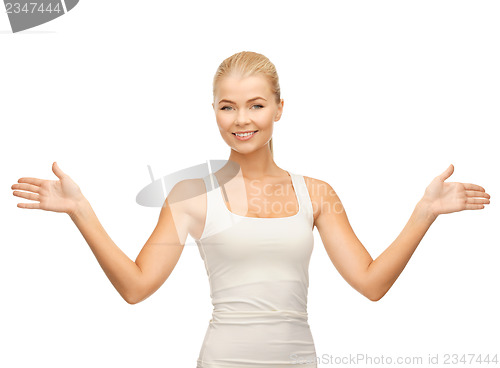 Image of woman in blank white t-shirt showing open palms