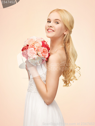 Image of woman with bouquet of flowers