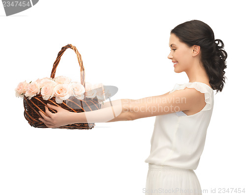 Image of woman with basket full of flowers