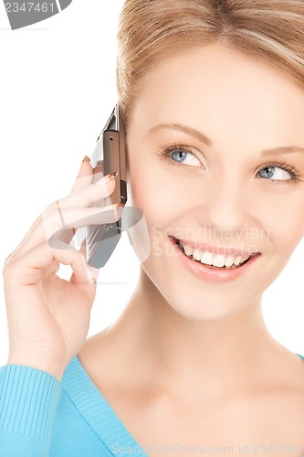 Image of businesswoman with cell phone calling