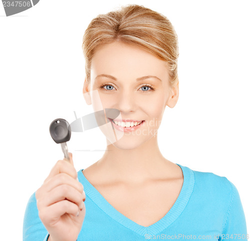 Image of happy woman with car key