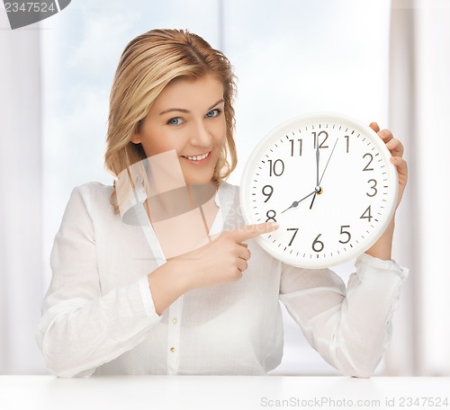 Image of woman with clock