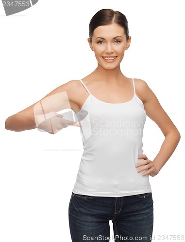 Image of calm and serious woman in blank white t-shirt