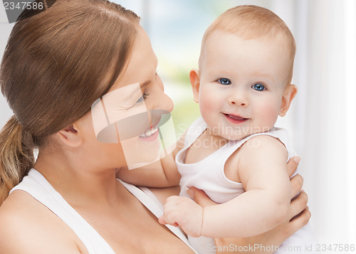 Image of happy mother with adorable baby