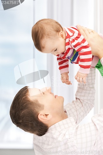 Image of happy father with adorable baby