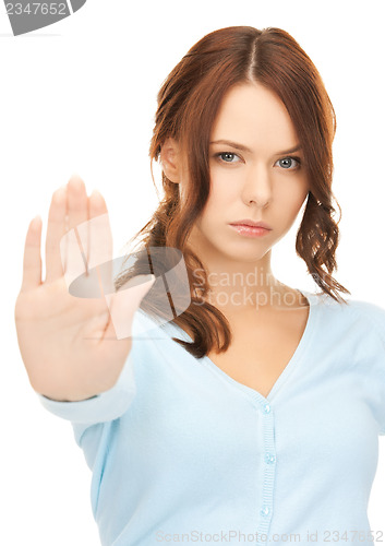 Image of woman making stop gesture