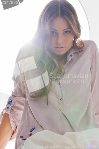 Image of beautiful woman in casual clothes
