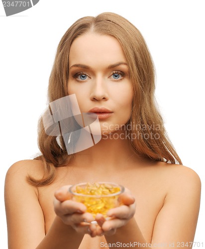 Image of woman with vitamins