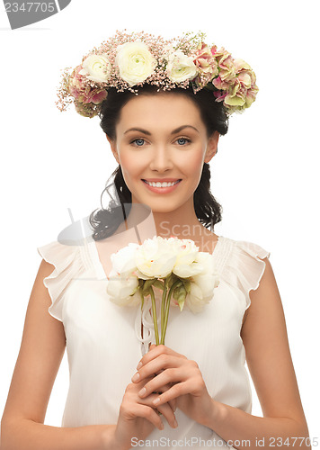 Image of woman wearing wreath of flowers