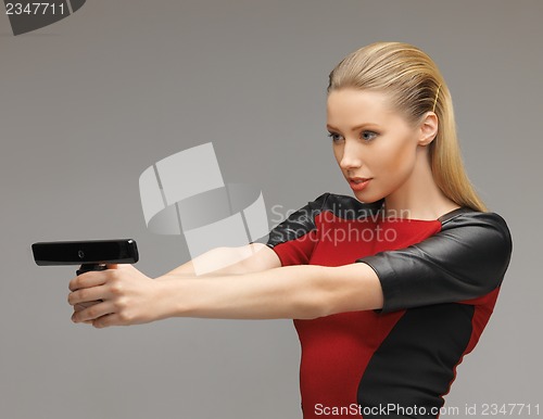 Image of futuristic woman with gadget