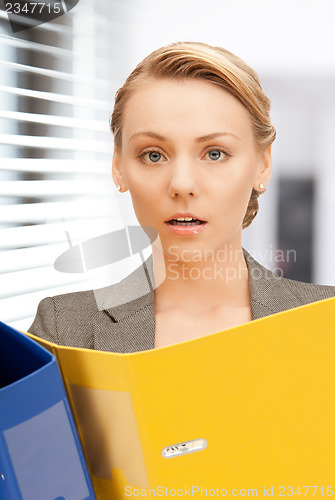 Image of woman with folders