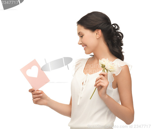 Image of young woman holding flower and postcard