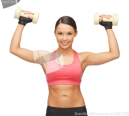 Image of woman with dumbbells