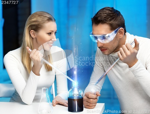 Image of man and woman in laboratory