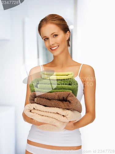 Image of lovely woman with towels