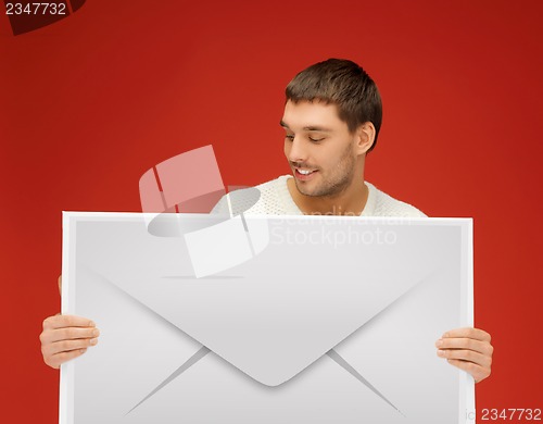 Image of man showing virtual envelope