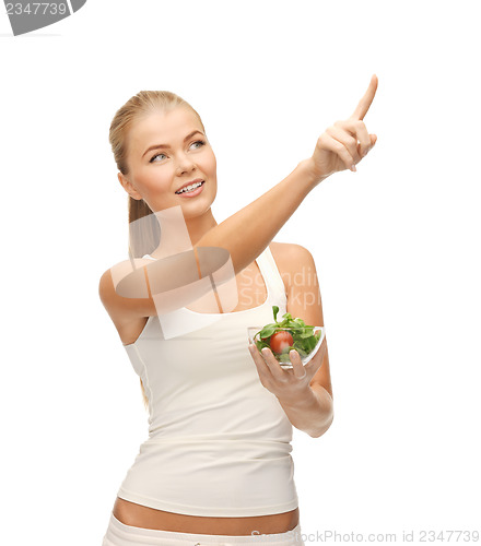 Image of healthy woman holding bowl with salad