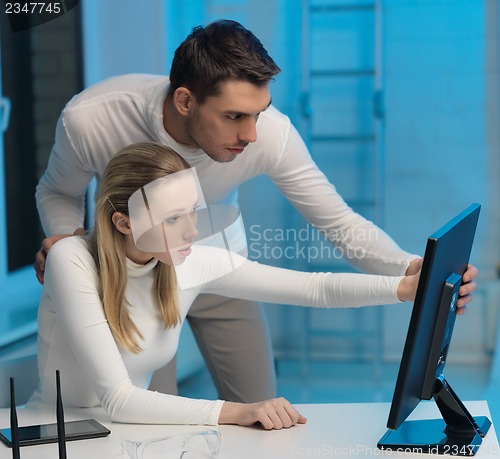 Image of man and woman in laboratory