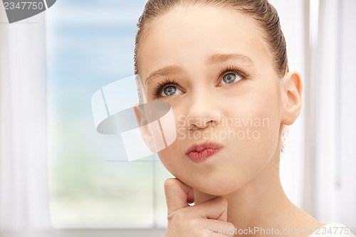 Image of pensive teenage girl