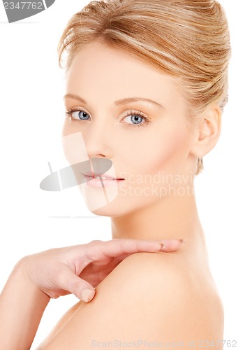 Image of face and hands of beautiful woman