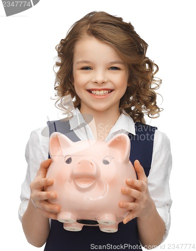 Image of girl with piggy bank