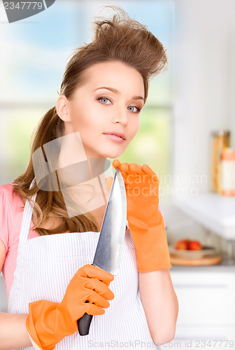Image of housewife with big knife
