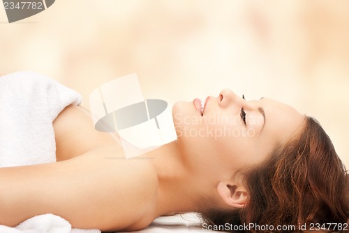 Image of beautiful woman in spa salon