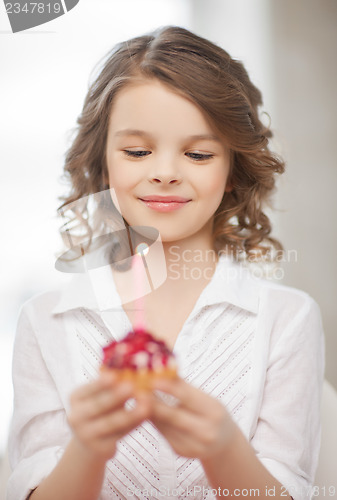 Image of girl with cupcake