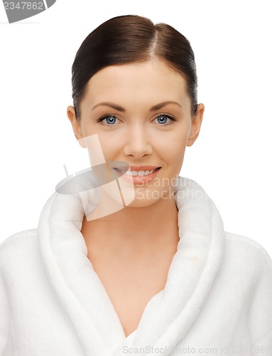 Image of beautiful woman in bathrobe