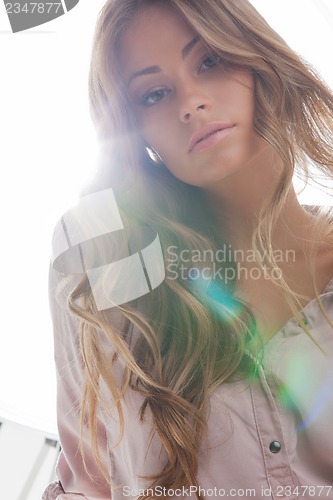 Image of beautiful woman in casual clothes