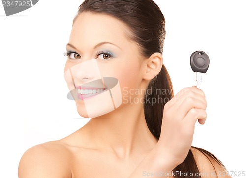 Image of happy woman with car key