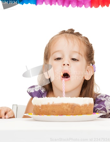 Image of litle girl with birthday cake