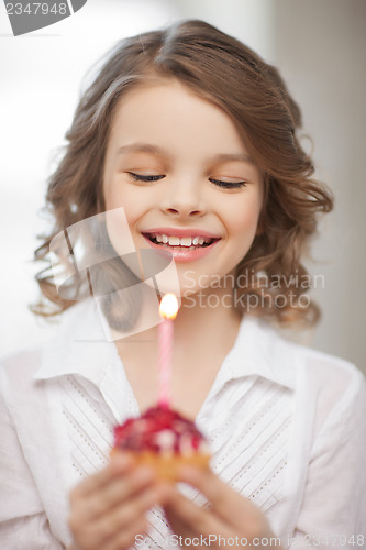 Image of girl with cupcake