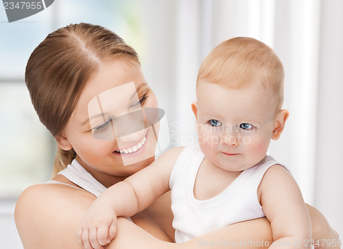 Image of happy mother with adorable baby