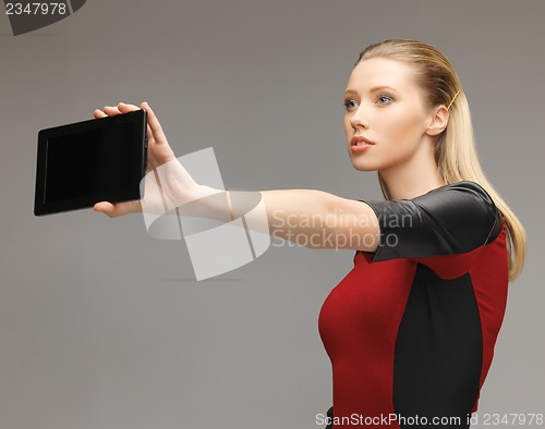 Image of futuristic woman with tablet pc