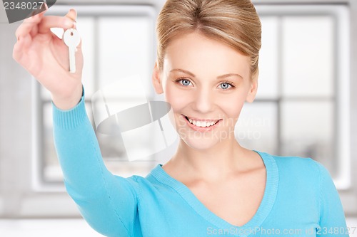 Image of happy woman with keys