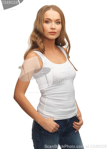 Image of calm and serious woman in blank white t-shirt
