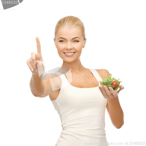 Image of healthy woman holding bowl with salad