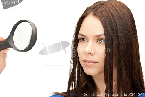 Image of woman with magnifying glass