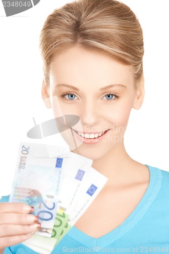 Image of businesswoman with euro cash money