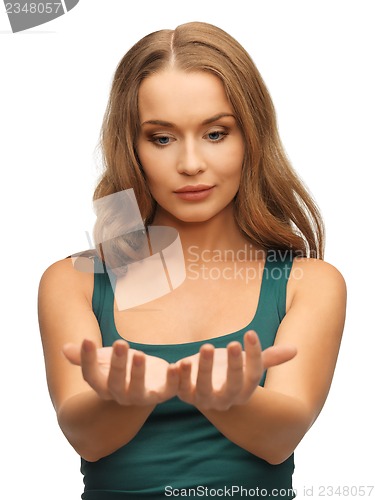Image of woman holding something on the palms